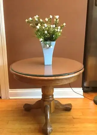 Round solid oak side table with glass top
