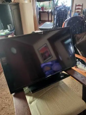 32-in Samsung television with remote