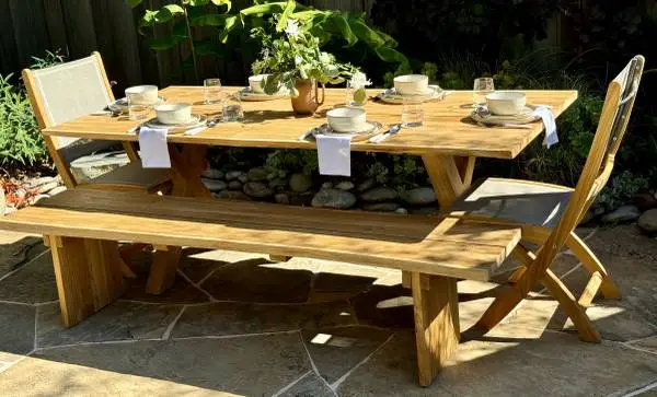 Live Edge solid teak outdoor tables and benches. Locally made !