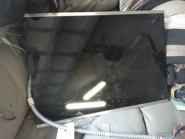 electric glass cooktop   28 X 19 openning