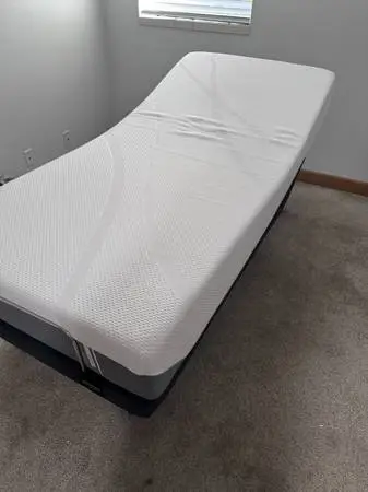FOR SALE TODAY AND TOMMOROW ONLY, temperpedic twin XL mattress and ergo frame w/