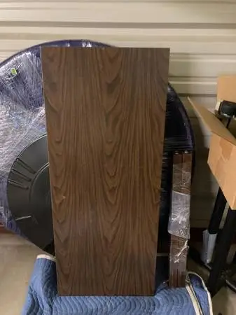 Round and rectangular walnut top tables