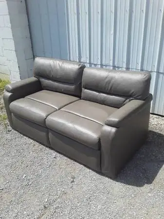 Leather fold-up bed couch. In great conition.