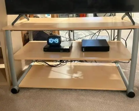 2 tall, stylish bookshelves and a matching tv stand. All for $99