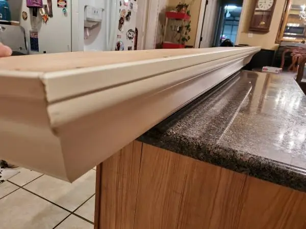 Large fireplace mantel or floating shelf