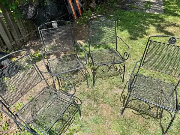 4 WROUGHT IRON PATIO CHAIRS $50