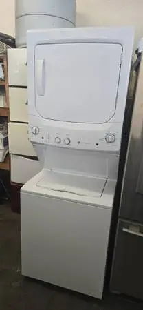 G.E STACKED ELECTRIC WASHER N DRYER LAUNDRY CENTER COMBO WARRANTY N DE