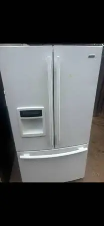 Clean white LG refrigerator will deliver and install