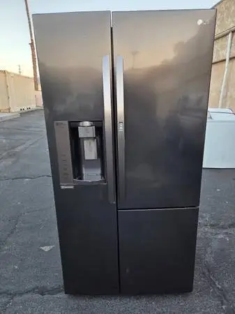 LG side by side black stainless refrigerator