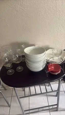 A lot dishes pots pans glasses bowls
