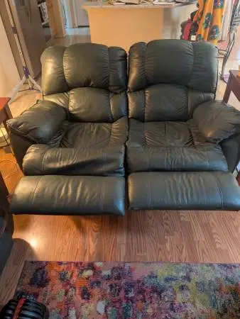 $100 for two green leather recliners very good condition
