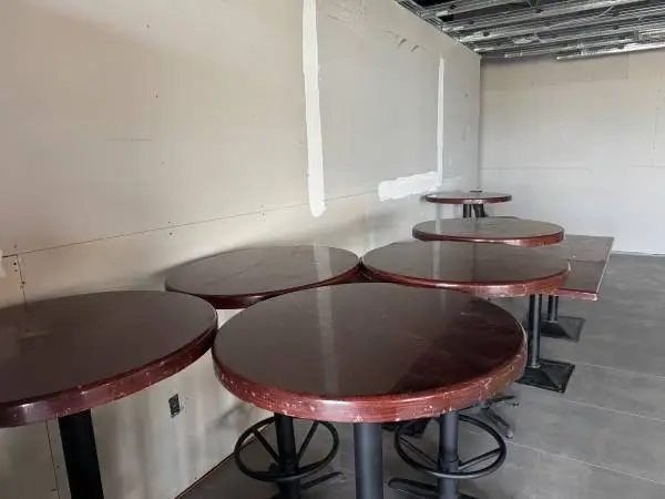 Tables, bar stools and chairs