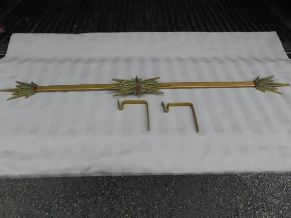 Very unusual deco styled curtain rod