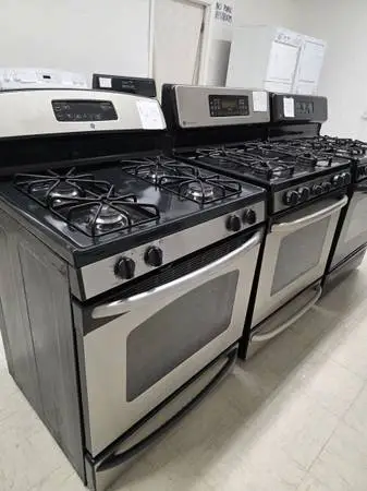 $275 Each Stainless & Black Gas Ranges