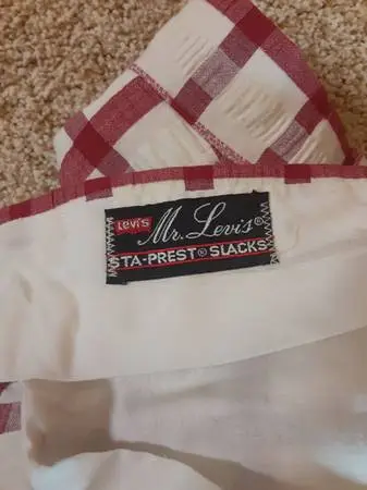 Red and white Levis bell bottom golf pants