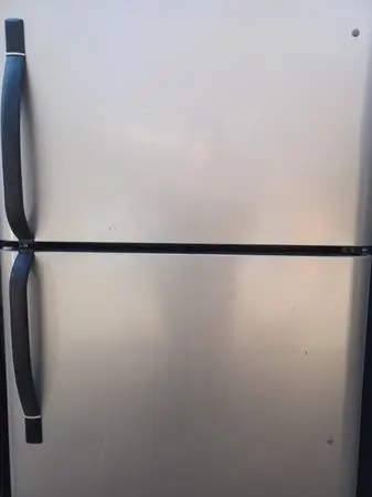 Stainless Refrigerator top freezer like new 6 months warranty