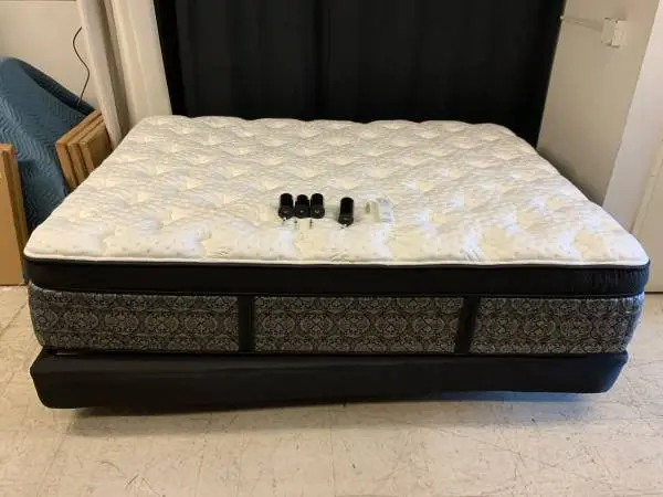 Adjustable bed with mattress