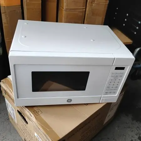 GE 0.7 cu. ft. 700-Watt Spacemaker Countertop Microwave in White