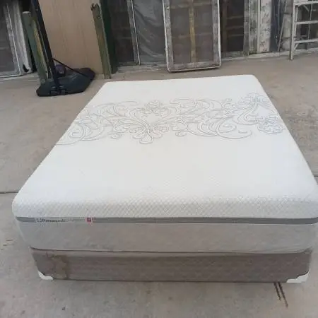 Used queen sealy hybrid mattress and box spring