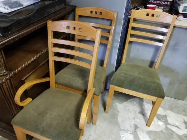 3 Kincade dining Chairs, two side and one arm style.