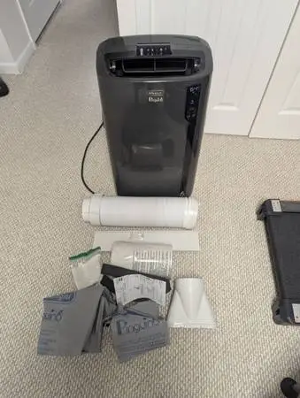 DeLonghi 14,000 BTU (750 sq ft) Portable A/C Air Conditioner with Heat, Remote
