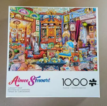 Aimee Stewart Puzzle by Buffalo Curiosity Shop Jigsaw Puzzle 1000 Pcs.