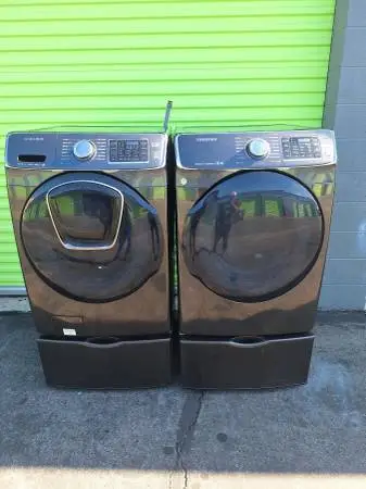 Samsung jumbo steam smart front load washer and gas dryer