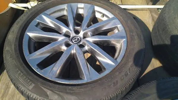 a PAIR of Mazda 20 wheels with good tires