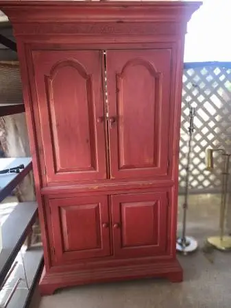 Red wood armoire