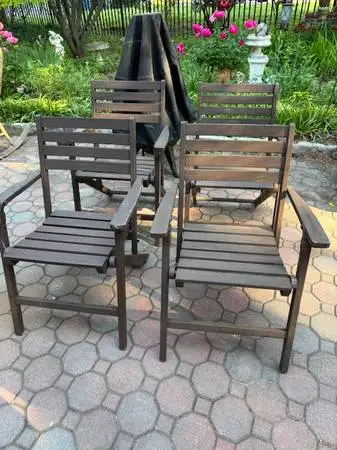 Set of four folding teak chairs