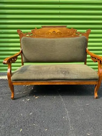 Antique Victorian Eastlake green velvet loveseat