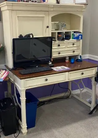 Office desk with tower and matching filling cabinets.