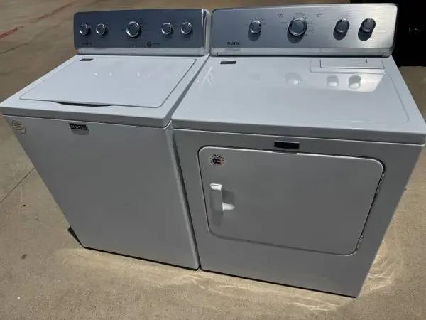 Silver panel Maytag commercial technology washer and Maytag dryer