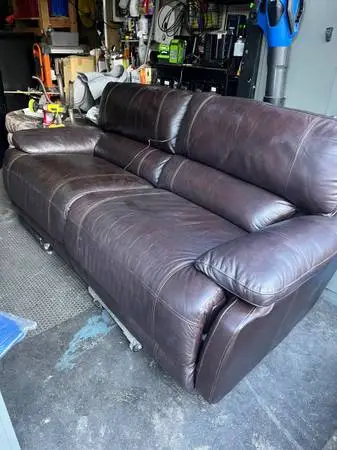 Brown leather reclining couch(electric)