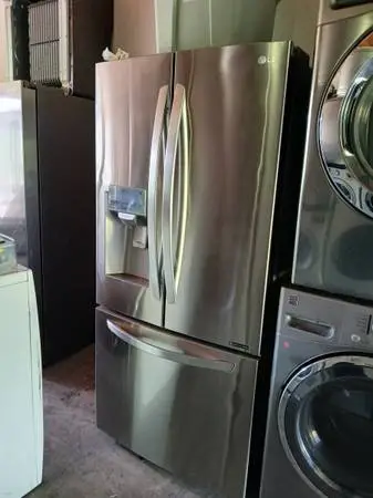 Lg 33 stainless steel compact French door refrigerator ice and water
