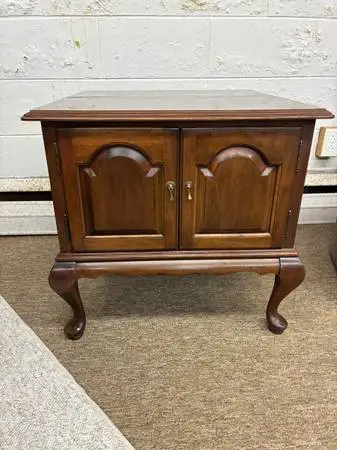 Traditional end table with cabinet
