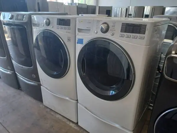 LG White Front Load Gas Washer/Dryer Set One Pedestals