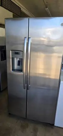 G.E STAINLESS COUNTER DEPTH SIDE BY SIDE REFRIGERATOR WARRANTY N DELIV