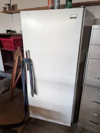 Free Whirlpool 12 CF Garage Freezer Not pretty but works great.