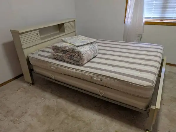 Full size bed set with new comforter and skirt