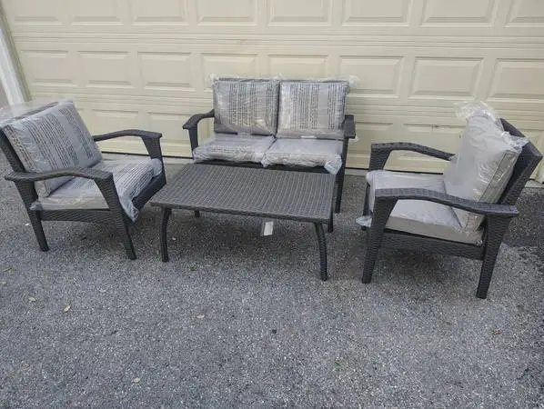 Outdoor patio wicker loveseat with 2 chairs and coffee table