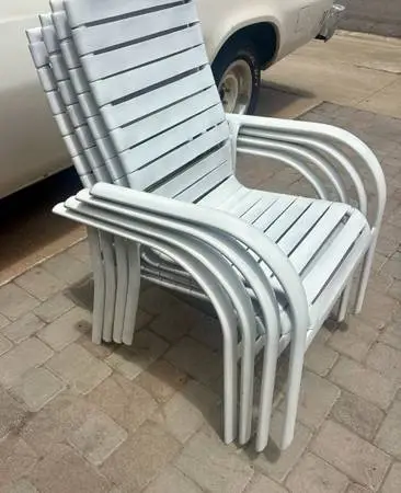 set a four outdoor white patio chairs