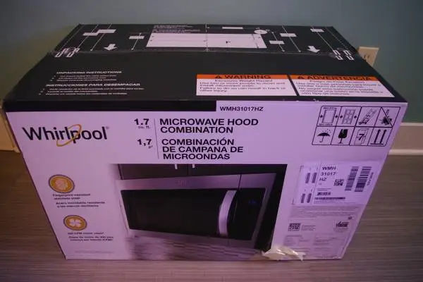 NIB Whirlpool Range Hood/Microwave Stainless Steel