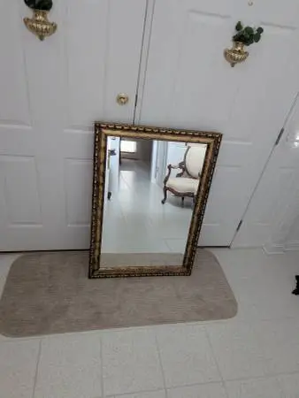 VINTAGE BEVELED MIRROR WITH ORNATE WOOD CRUST