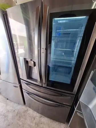 Lg four door refrigerator black stainless steel