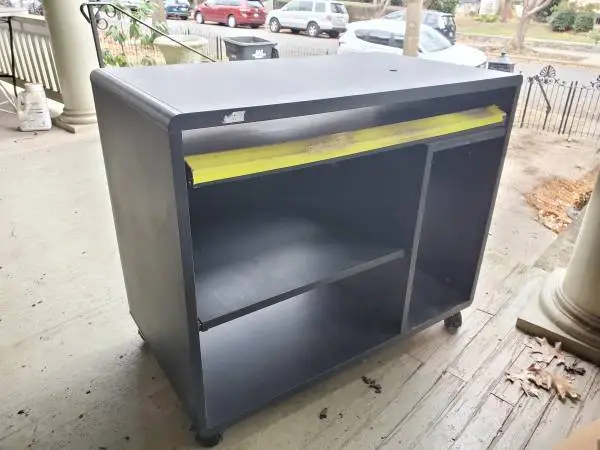 Compact Black Desk on Wheels with Sliding Shelves