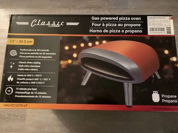 Pizza oven-NEW IN BOX-What a deal!