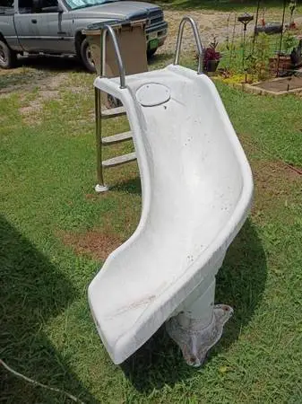 Slide for a pontoon boat