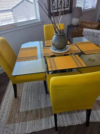 Yellow Chairs and Glass Table