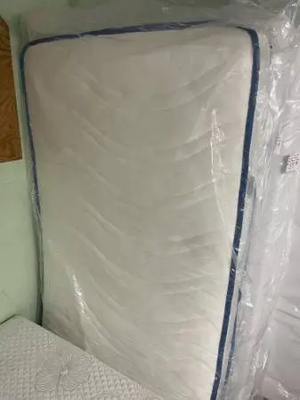 Brand new 6 inch coil spring mattress, twin size